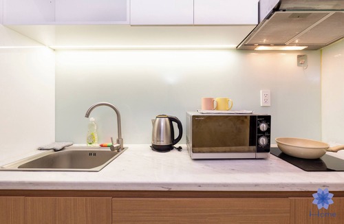 Tan Binh Apartment | Studio Room in Modern building with AC in vibrant HCM; 1.3km from TSN airport
