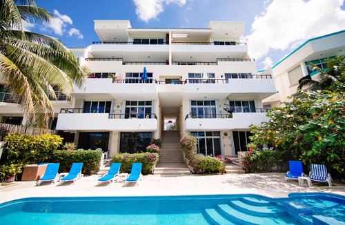 San Miguel Condo | Stunning Decorated Condo Rare Ocean Setting Snorkling paradise walk to town best