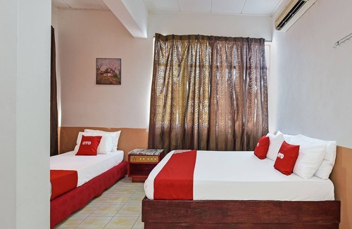 Larut Hotel | Super OYO Capital O 90659 Raintown Timbers Hotel