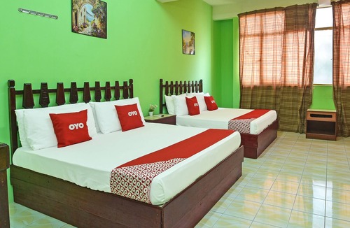 Larut Hotel | Super OYO Capital O 90659 Raintown Timbers Hotel