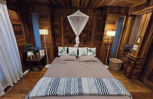 Kanchanaburi House | three little birds 2 bedroom (บ้านไม้กลางสวน)