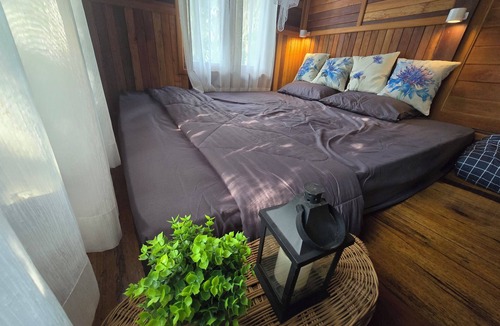 Kanchanaburi House | three little birds 2 bedroom (บ้านไม้กลางสวน)