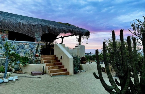 Cabo Pulmo House | Traditional stone palapa retreat with ocean and desert views