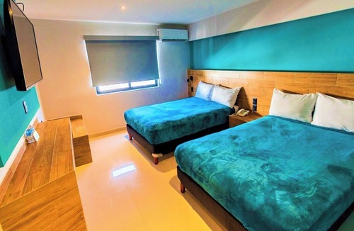 Zona Dorada Hotel | Triple Coastal Stay Offering Comfort, Convenience & Easy Access to Town
