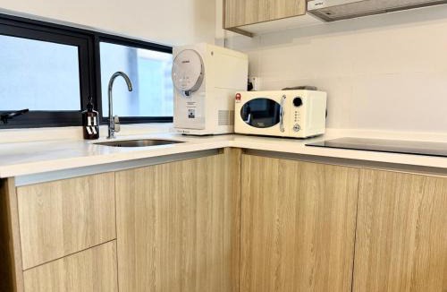 Downtown George Town Apartment | Tropicana 218 Macalister Georgetown Modern 3BR Suites with Infinity Pool #Near Island Hospital Eateries Convenience Store