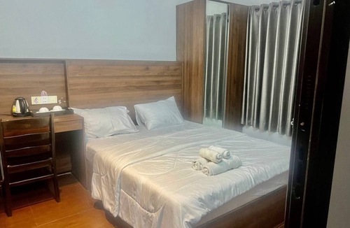 Daun Penh Apartment | Two bedroom apartment with an outdoor balcony area facing the Mekong River.