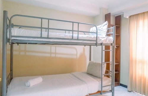 Suko Manunggal Apartment | Very Spacious 3BR High Floor Taman Beverly Apartment By Travelio