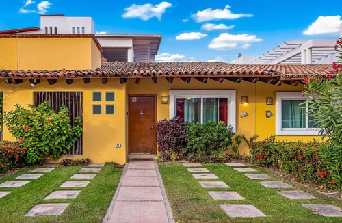 Flamingos House | Vibrant coastal home with private plunge pool & patio + resort pool access