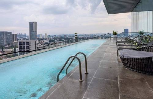 Zona Minerva Apartment | Where Comfort Meets the Skyline