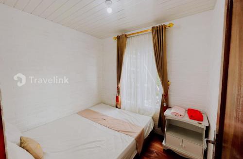 Kejajar Cabin | White Cabin By Travelink