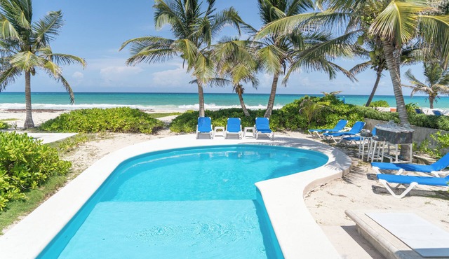 4bdr Beachfront villa in secluded Playa del Secreto, hosts up to 12 guests.