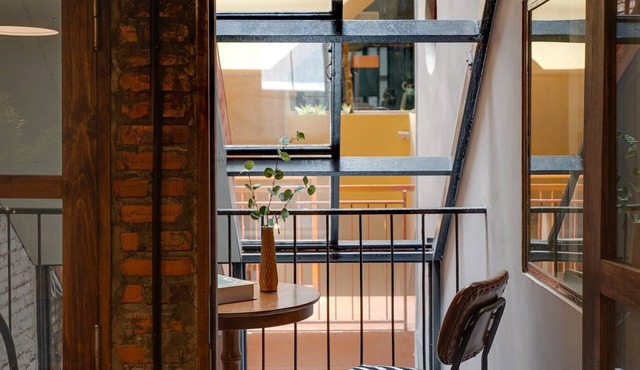 4BR Industrial Gem with Rooftop Garden by Bến Thành
