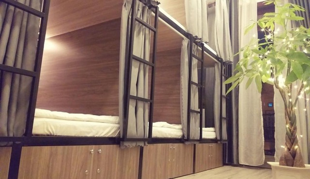 Adora Dorm bed in the center with balcony and rooftop since 2026