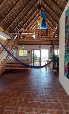 casa cabaña con vista al océano
