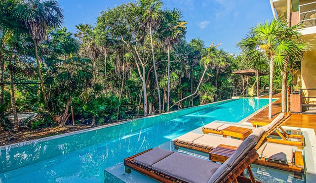 Central apartment with amazing Caribbean views, balcony, beach-view pool, & AC