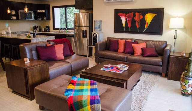 Charming 2-bedroom condo with WiFi, AC in wonderful Puerto Aventuras