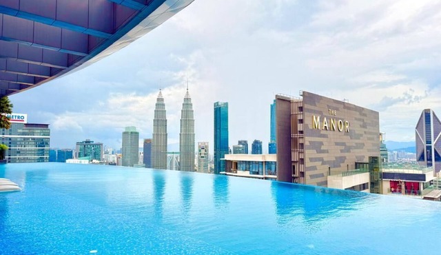 Cozy 1-bedroom apartment in beautiful Kuala Lumpur with AC and gym access