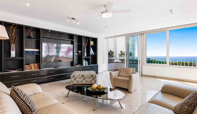 Elegant multi-level penthouse with rooftop Jacuzzi, bay views, pool & game room