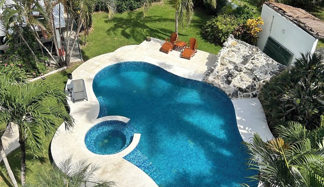 Four Bedrooms and large private pool steps from Paradise Beach