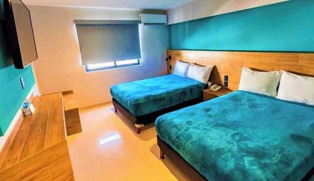 Group Stay Made Easy with Four Fresh Rooms Near Sábalo Beach & Nightlife