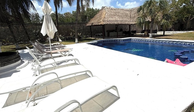 Hacienda with its own cenote and volleyball courts