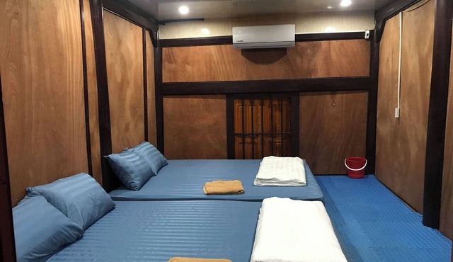 Homestay yên tĩnh với khuân viên xanh, chỉ mất 5 phút đi bộ là tới bãi biển.