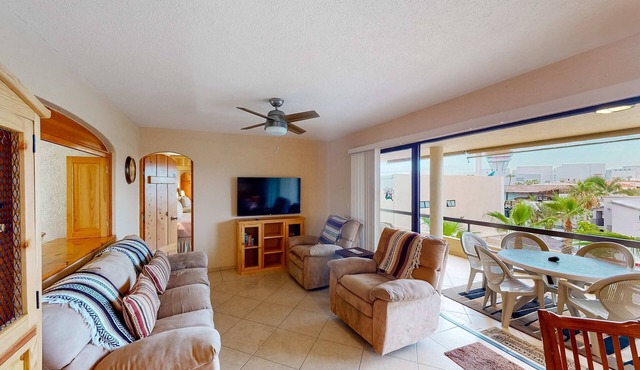 Inviting apartment across from the beach with pool, grill, balcony & golf nearby