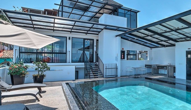 Penthouse Condo with Private Rooftop Terrace. Short walk to the Beach & Malecón.