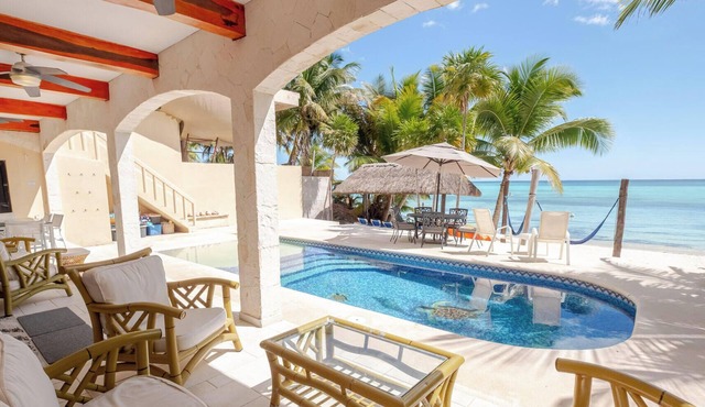 Premier snorkeling from this beautiful beachfront villa, pool, AC and WiFi!