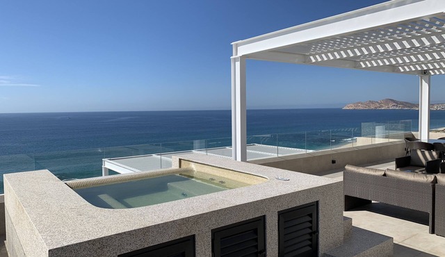 Spectacular 3 bedroom PH condo with massive terrace and panoramic ocean views .