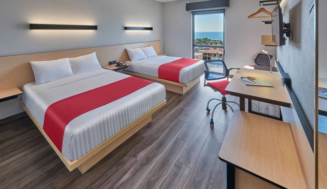 Stay Steps from Beach & Shops in Modern Vallarta Hotel Rooms - 4 Units