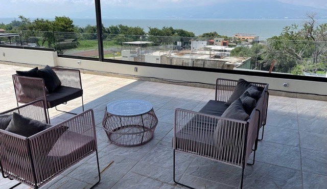 Step into serenity in our secure vacation home on Lake Chapala's shores,