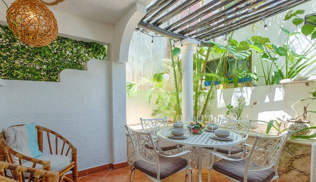 Steps to the sea! Charming garden view studio with beach access, WiFi and AC.
