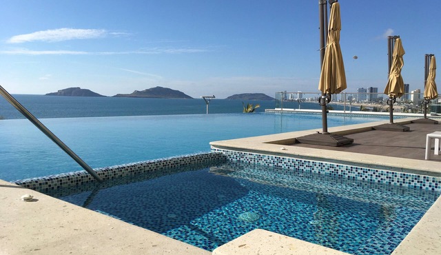 Sunset View Luxury 7th floor "Malecon -Oceanfront" Condo in beautiful Mazatlan.