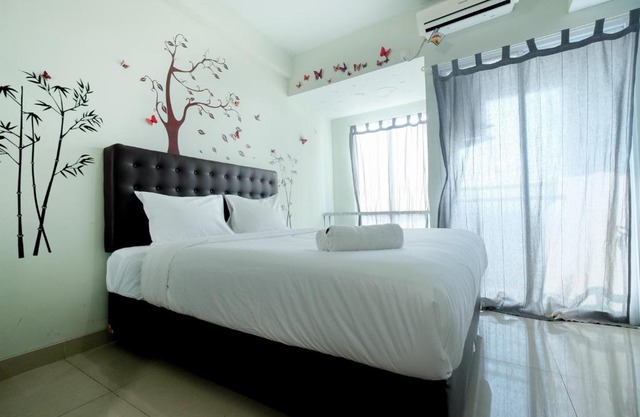 Homey Studio @ Grand Dhika City Apartment By Travelio