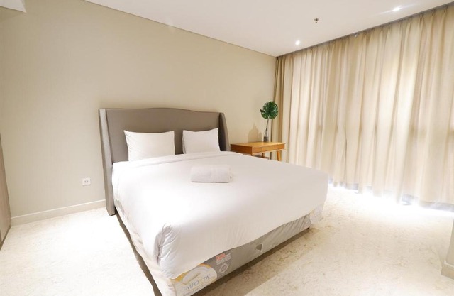 Spacious and Modern 2BR The Residence Ciputra World 2 Apartment near to SCBD By Travelio