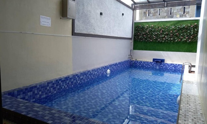 Dinoyo Villa | 121 m² Villa ∙ 4 bedrooms ∙ 12 guests