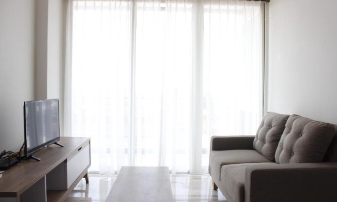 Arjuna Apartment | Artistic 3BR Apartment at Landmark Residence By Travelio