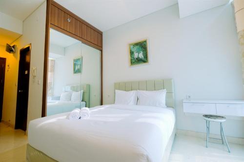 Menteng Apartment | Best Emerald Studio Room Apartment at Capitol Park Residence By Travelio
