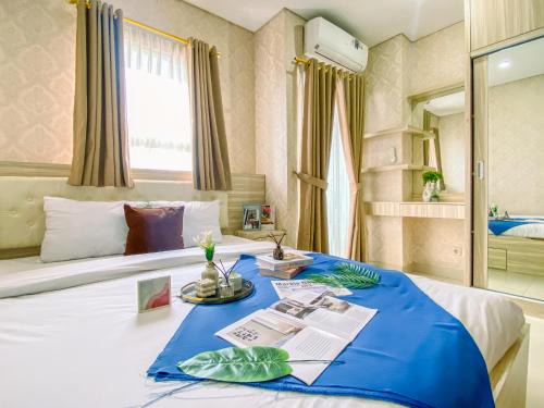 Pondokcina Apartment | Cozy and Elegant 1BR Apartment at Atlanta Residences By Travelio