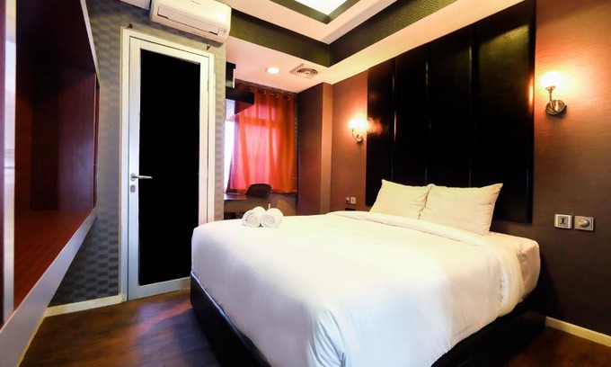 Sunter Apartment | Homey 2BR at Green Lake Sunter Apartment By Travelio