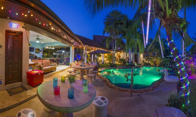 Nong Pla Lai Villa | Relaxing Palm Pool Villa & Tropical Illuminated Garden & Swimming Pool.