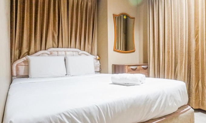 Suko Manunggal Apartment | Scenic 2BR Apartment at Taman Beverly By Travelio