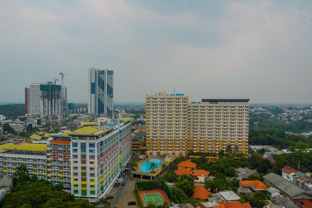 Pondokcina Hotel | Cozy Living and Modern 1BR Apartment at Atlanta Residences By Travelio