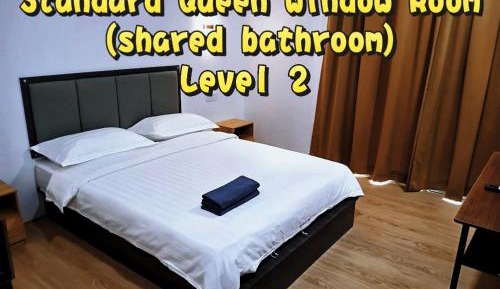 Standard Double Room with Shared Bathroom