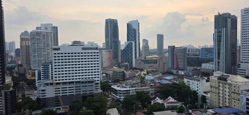 One-Bedroom Apartment with Balcony and City View