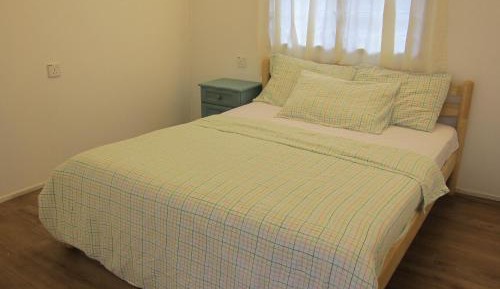 Queen Room with Shared Bathroom