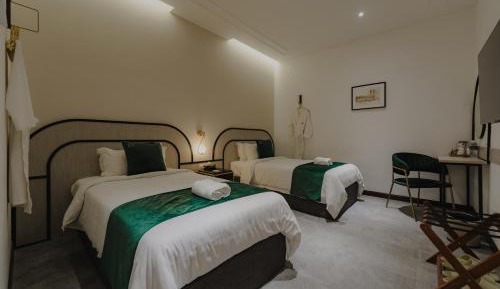 Standard Twin (No Window) with Shared Bathroom