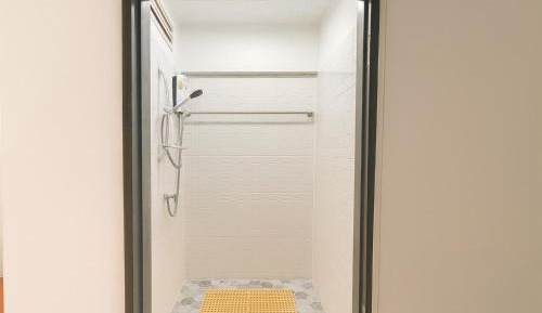 Single Bed in Dormitory Room