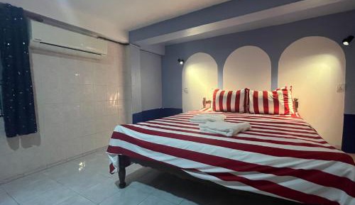 Queen Room with Shared Bathroom
